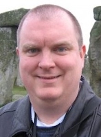 a photograph of Rev. Brian P. Hughes, BCC