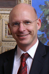 a photograph of Stanislas Dehaene, PhD