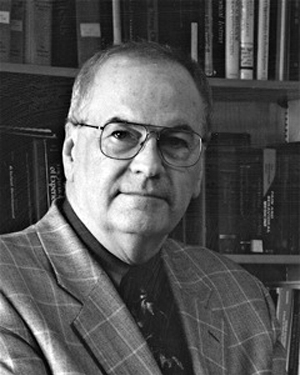 a photograph of Travis Thompson, PhD